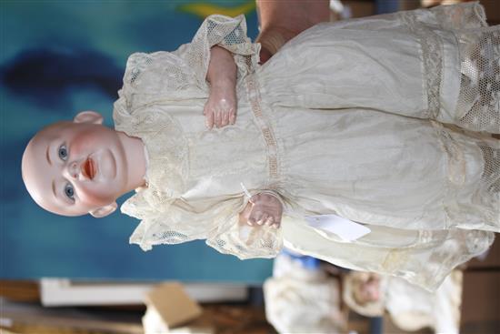 A Kestner character doll, 16in., damaged head, and a Dream baby, closed mouth, vintage clothes, 22in. (2)